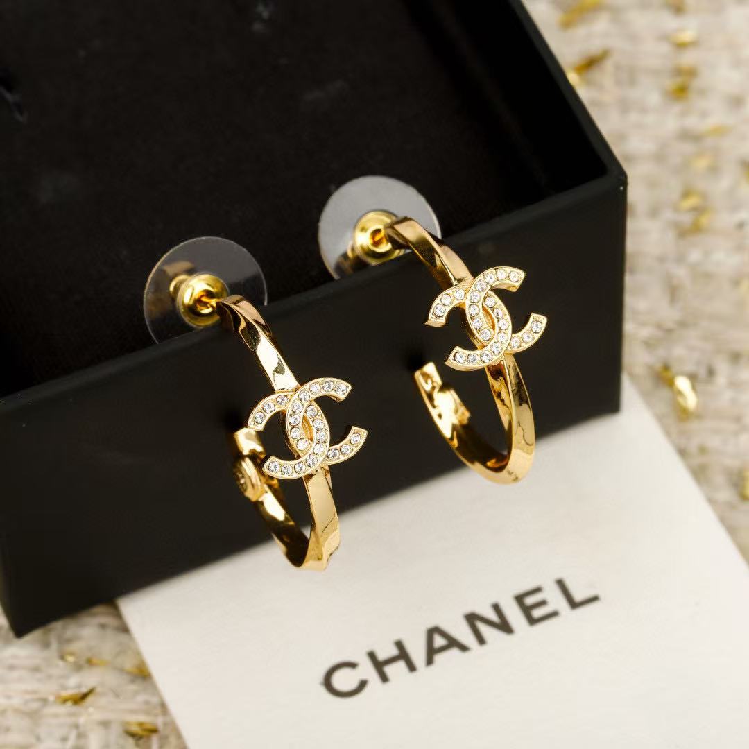 chanel pale gold cc pendant hoop earrings