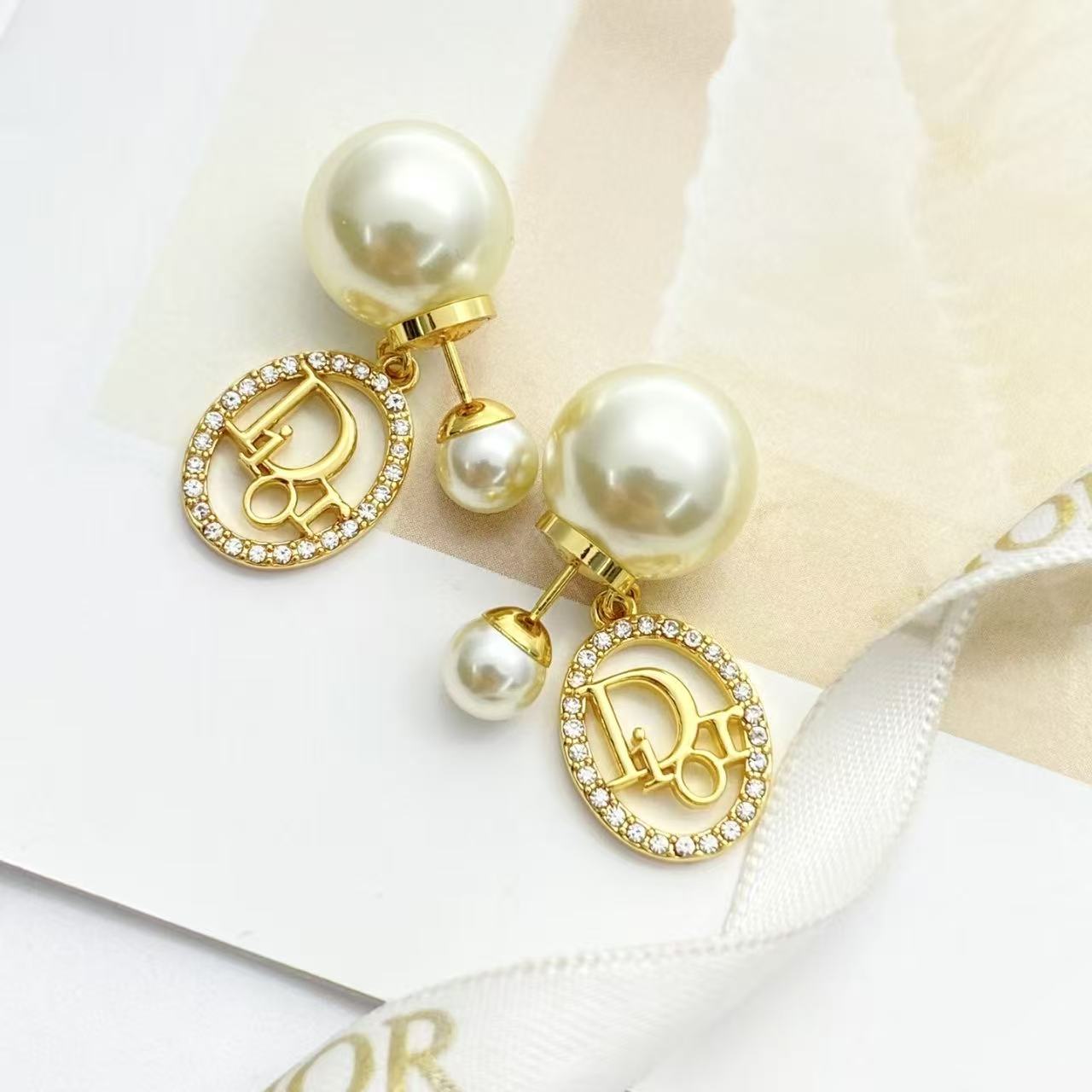 dior gold pearl cannage circle drop earrings