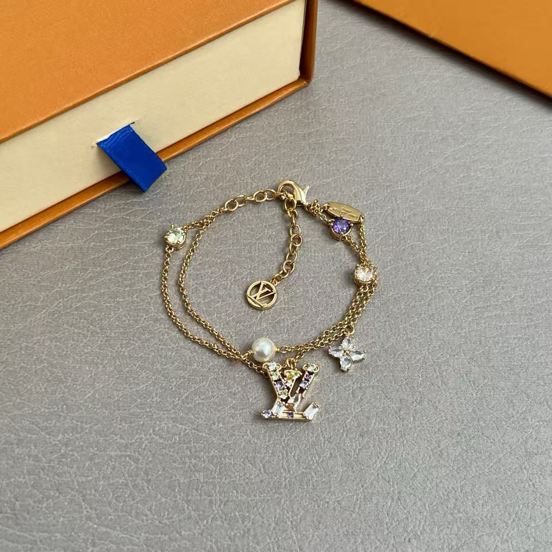louis vuitton gold lv iconic charms bracelet