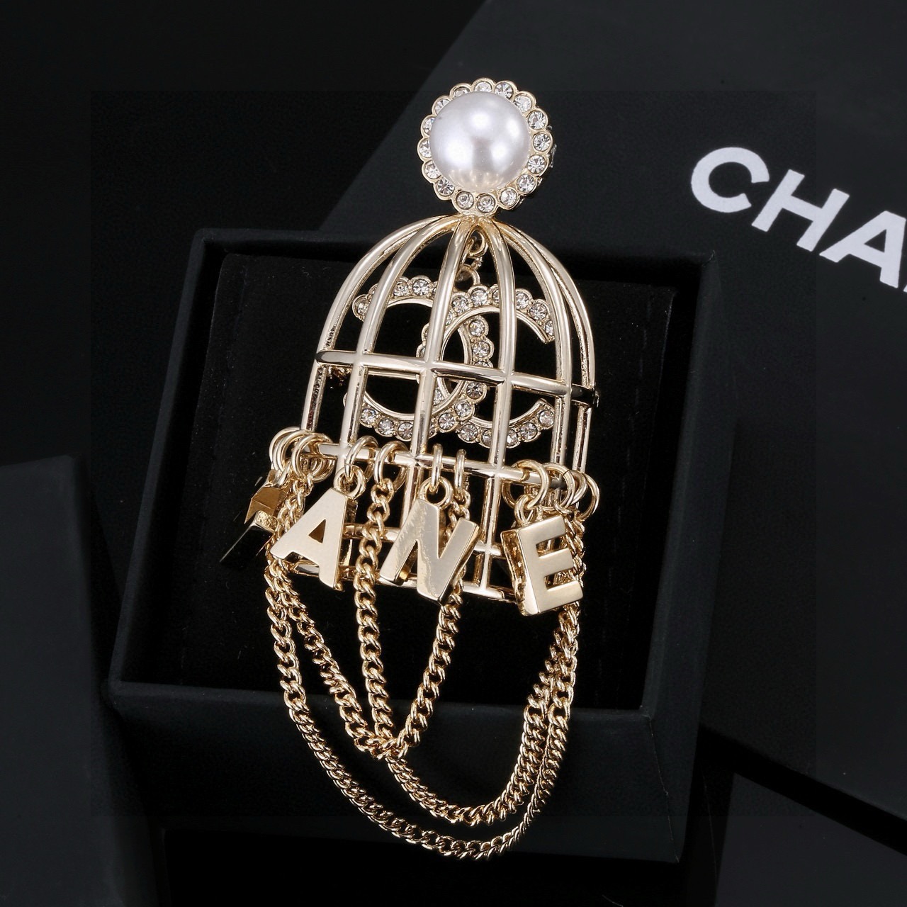 chanel pearl birdcage chain brooch