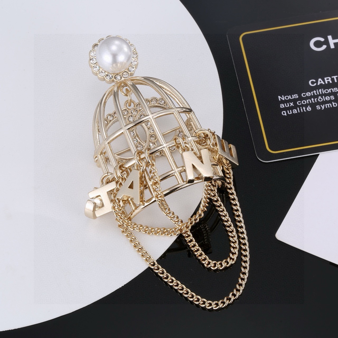 chanel pearl birdcage chain brooch