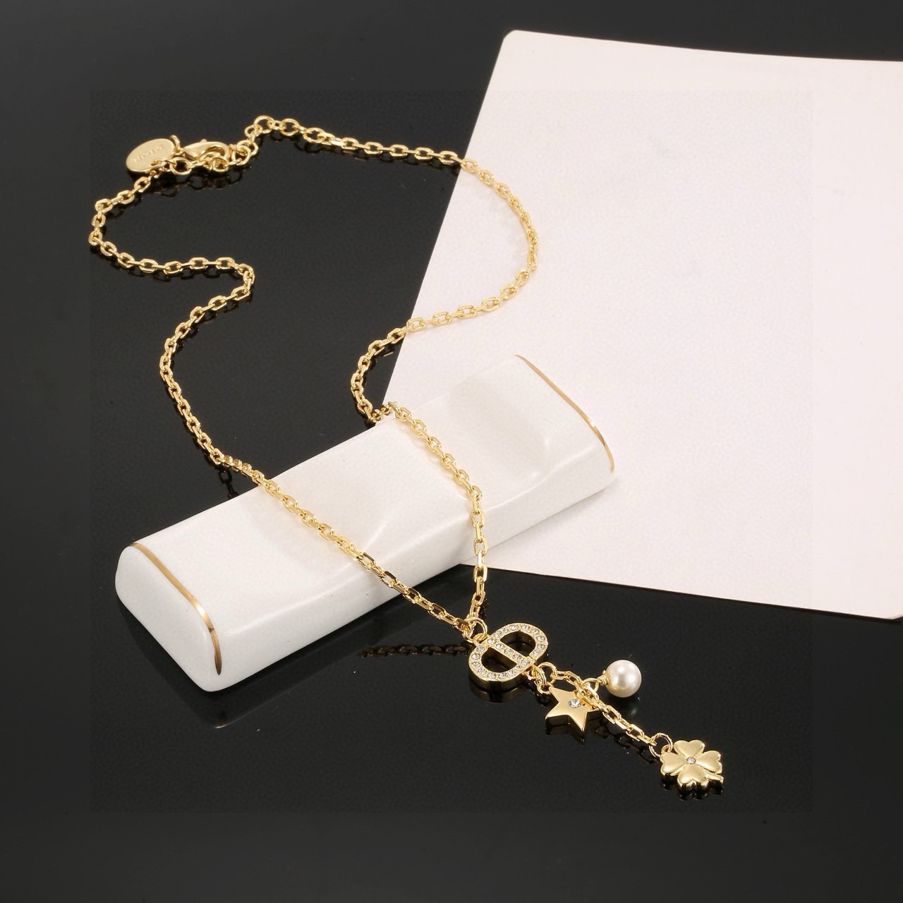 dior gold jadior clover charm pendant necklace