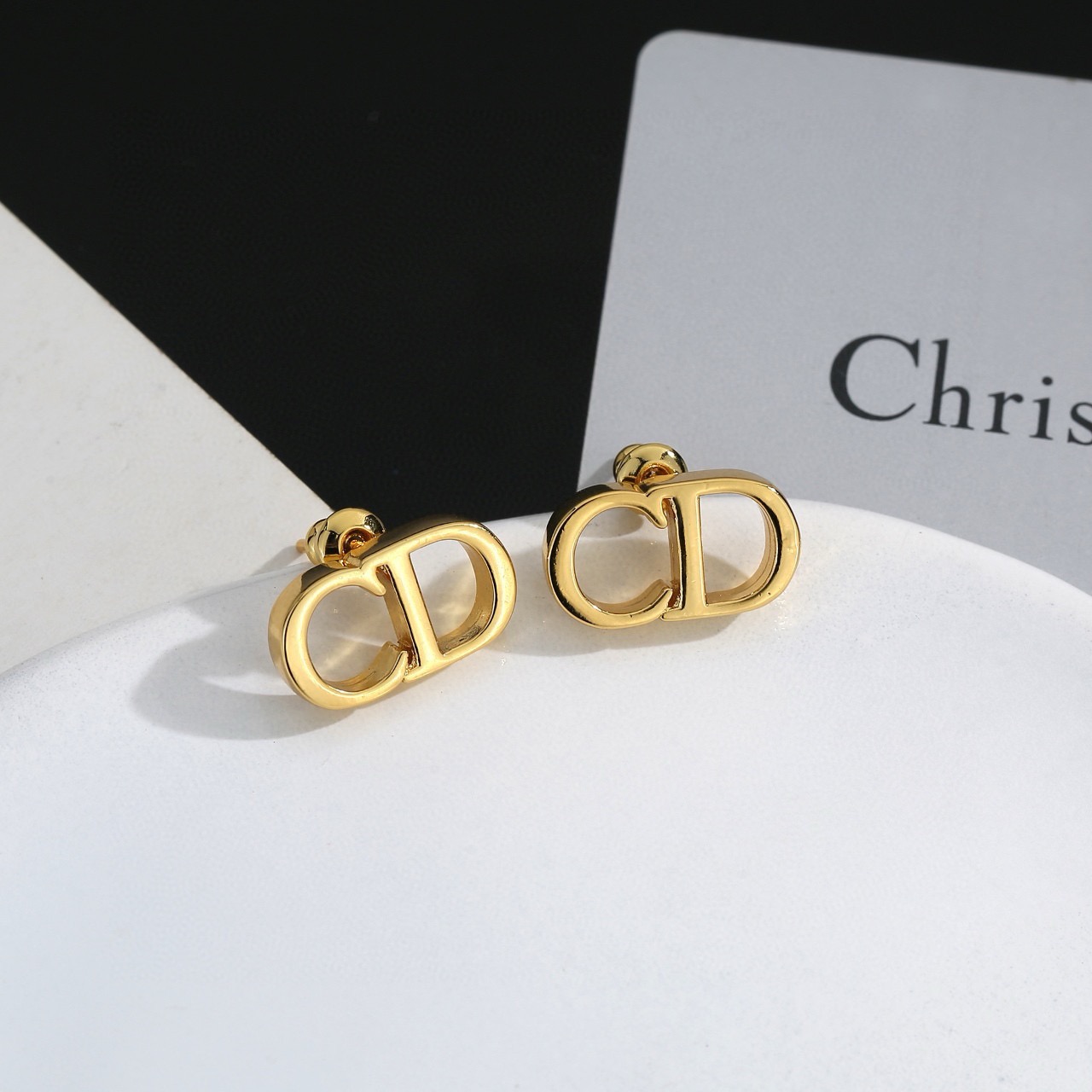 dior gold cd signature stud earrings