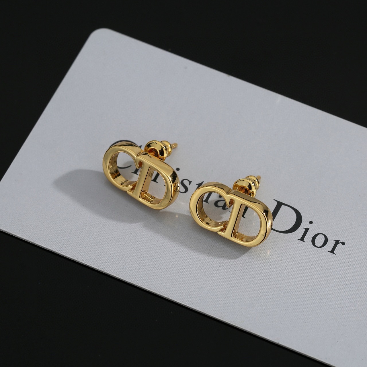 dior gold cd signature stud earrings