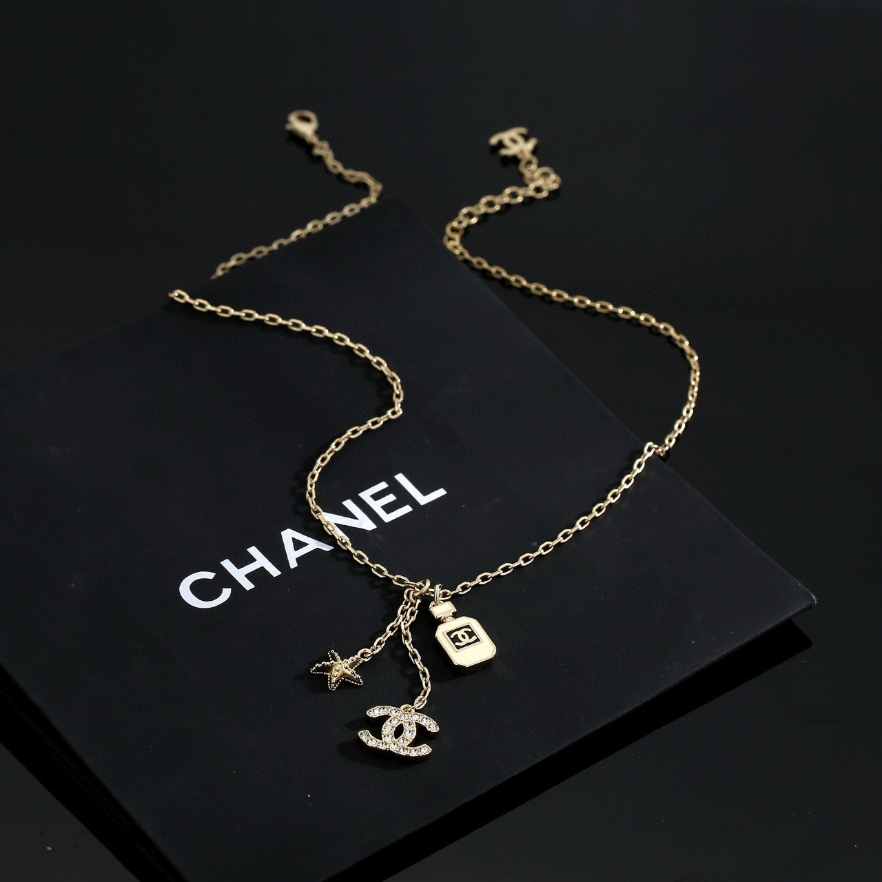 chanel crystal perfume bottle cc charm necklace