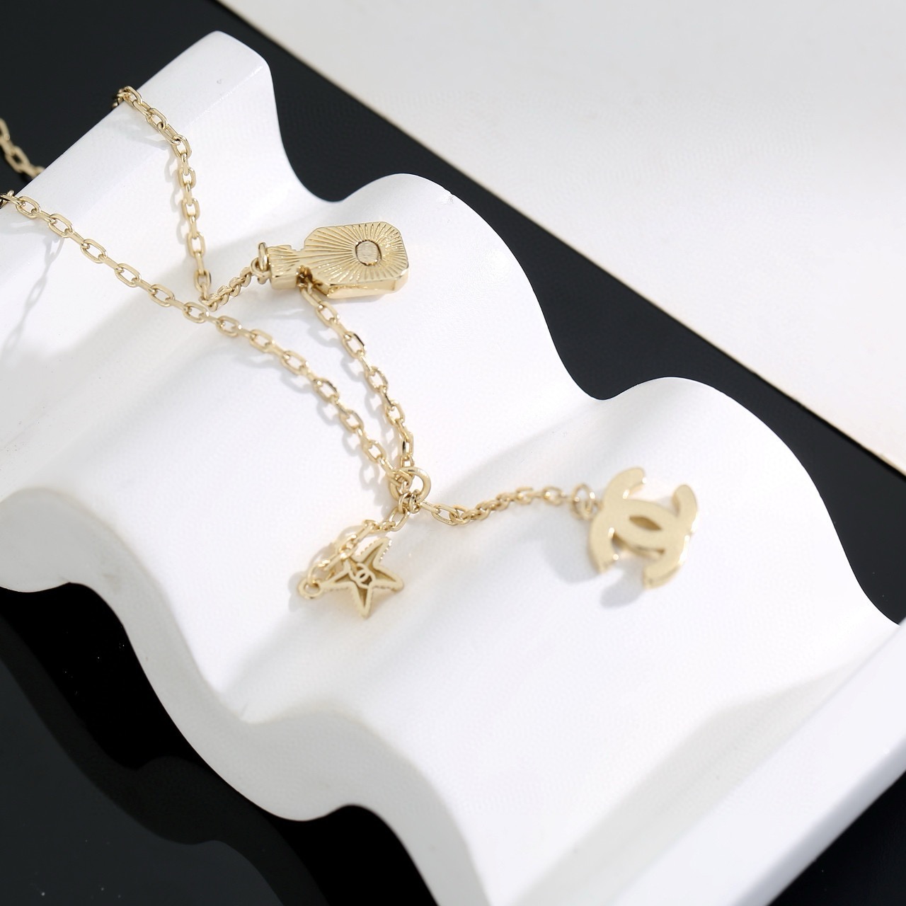 chanel crystal perfume bottle cc charm necklace