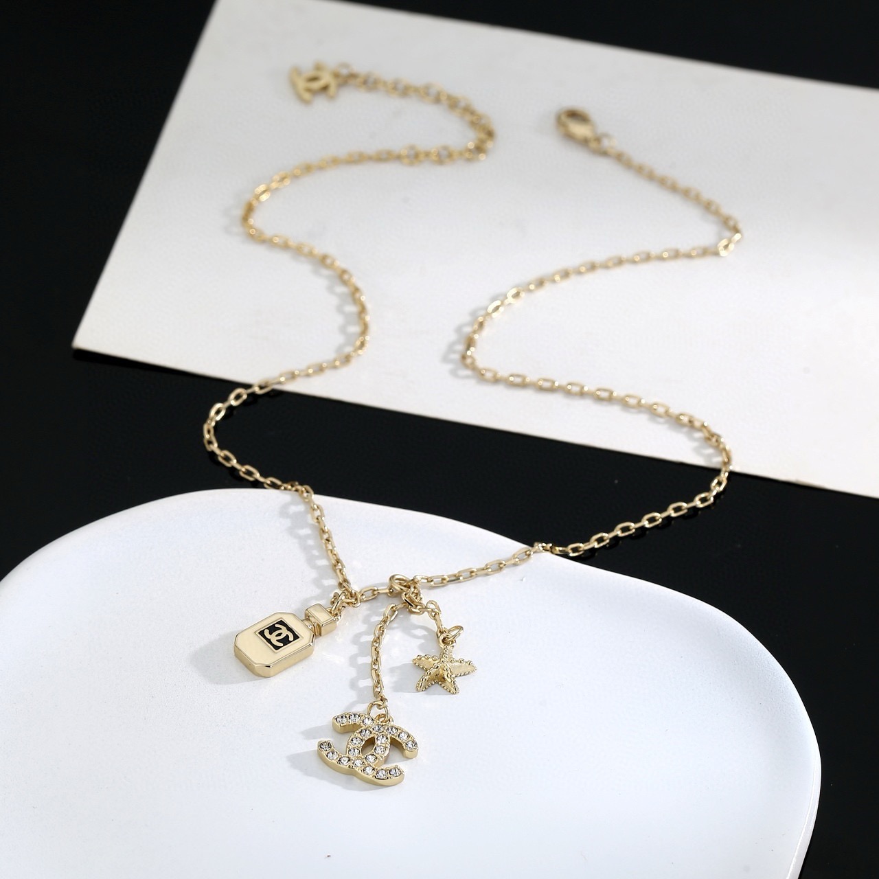 chanel crystal perfume bottle cc charm necklace