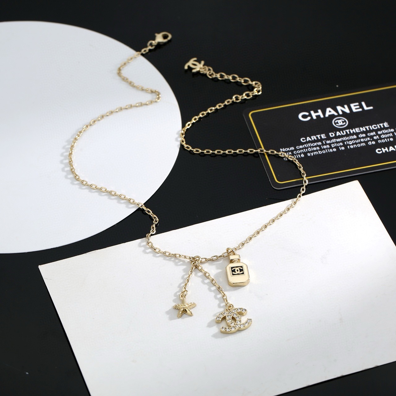 chanel crystal perfume bottle cc charm necklace