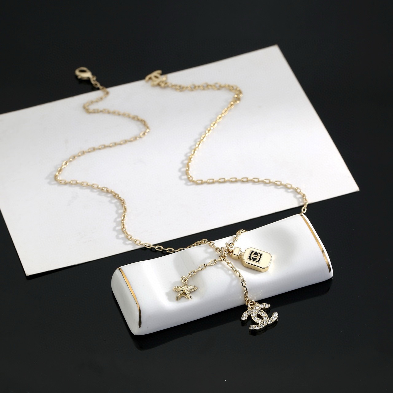 chanel crystal perfume bottle cc charm necklace