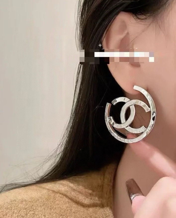chanel silver interlocking cc hoop earrings