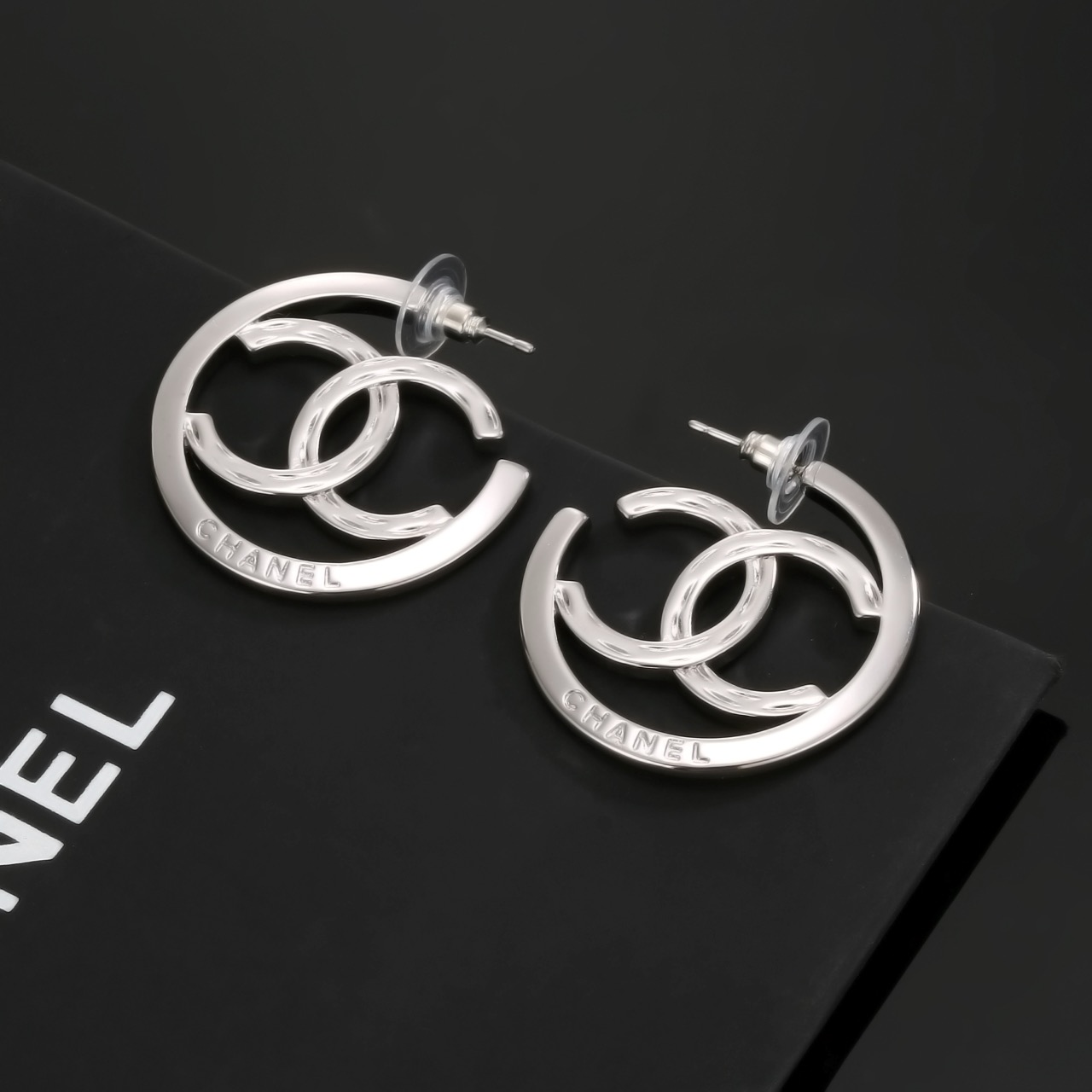 chanel silver interlocking cc hoop earrings
