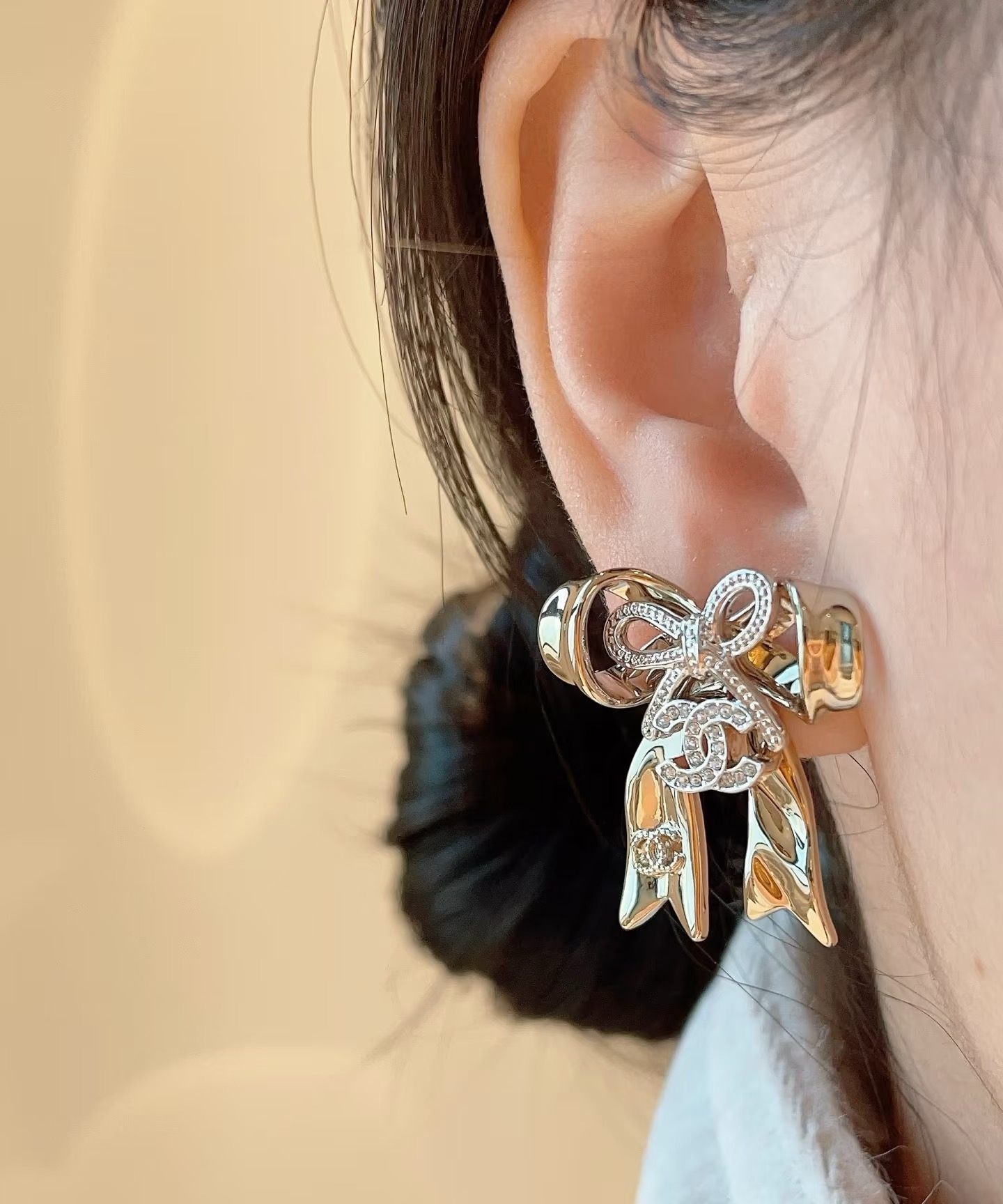 chanel silver crystal cc bow drop earrings