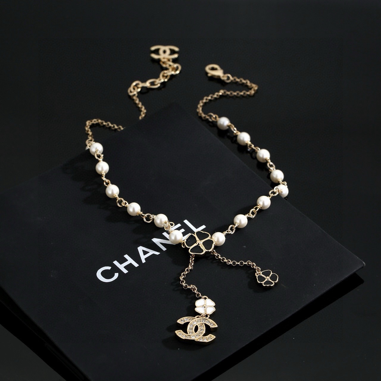 chanel pearl cc charm lariat necklace