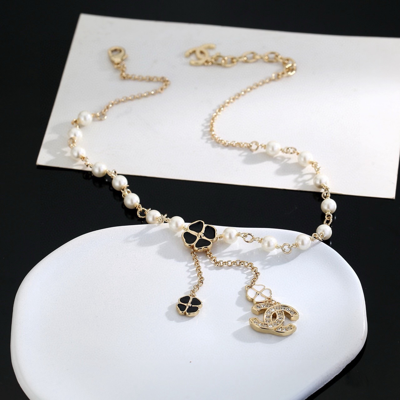 chanel pearl cc charm lariat necklace