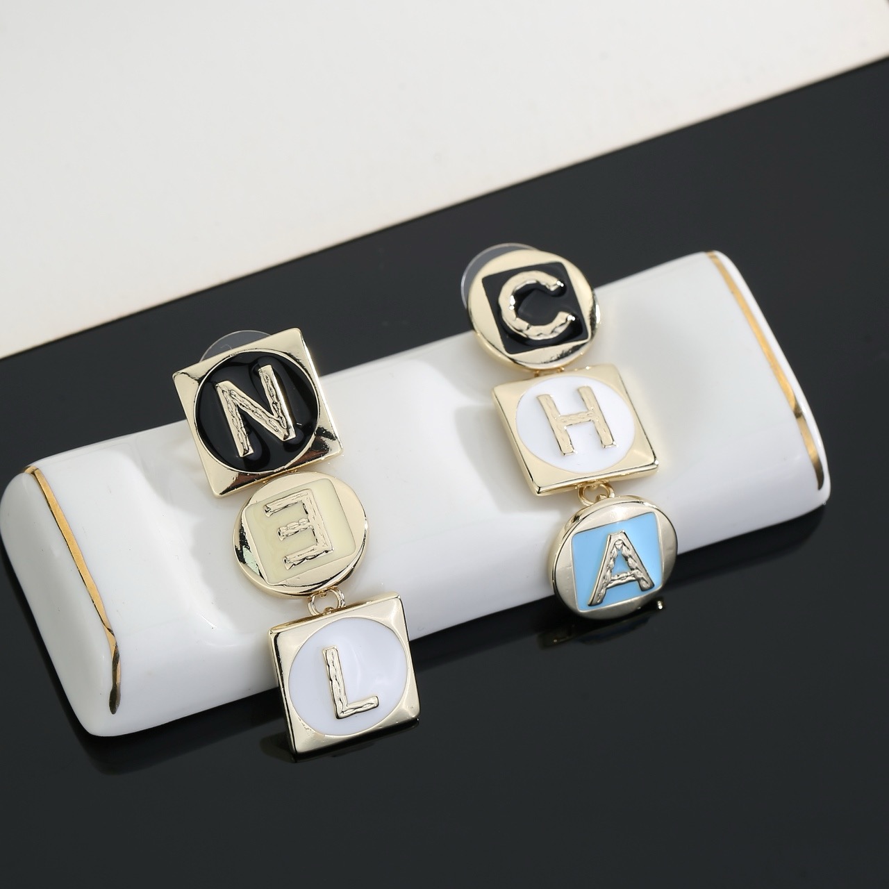 chanel gold multicolor letter drop earrings