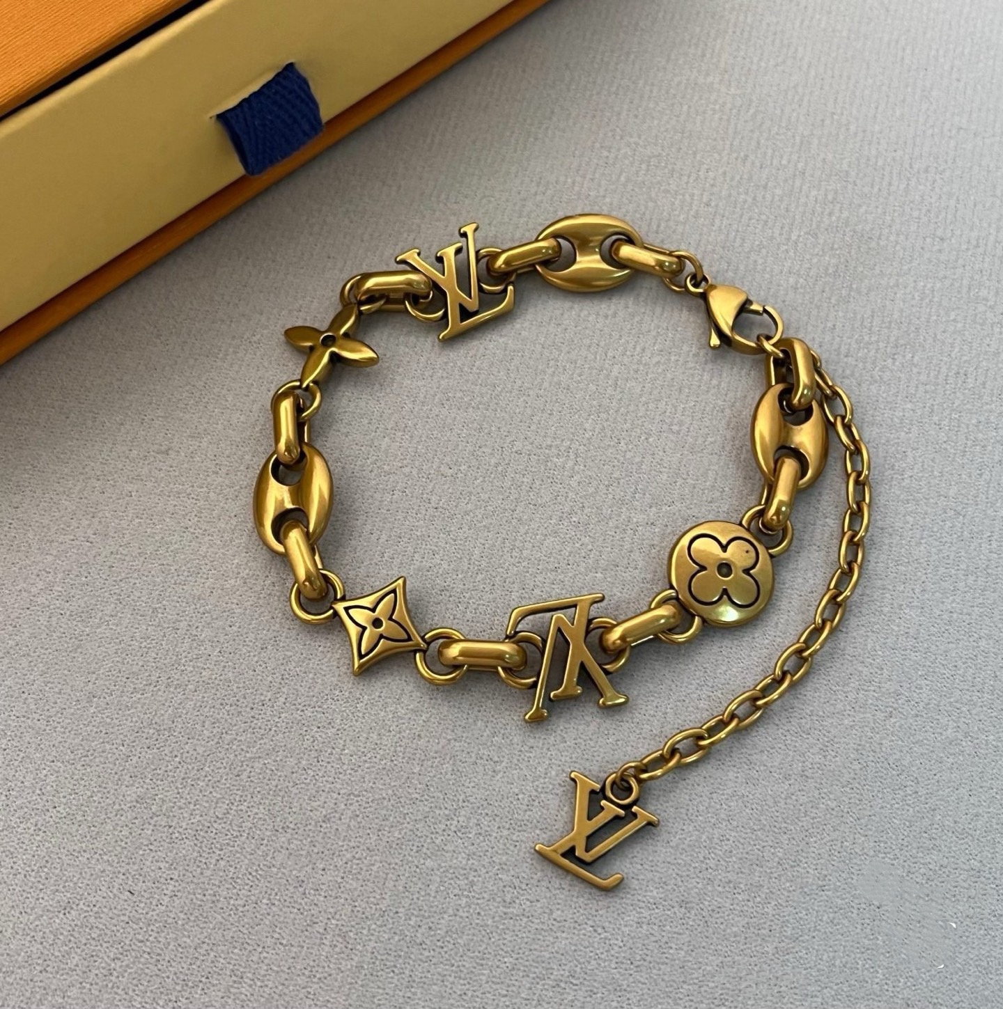 louis vuitton gold letter link bracelet