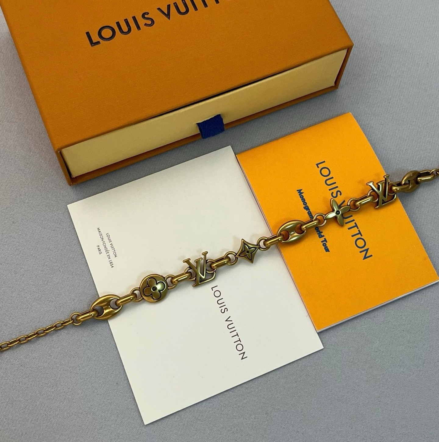 louis vuitton gold letter link bracelet