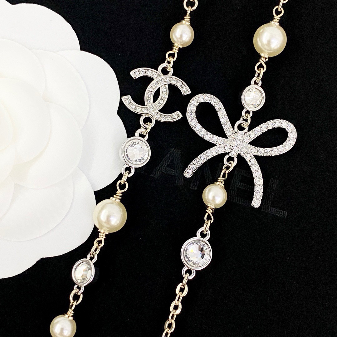 chanel pearl cc crystal bow long necklace
