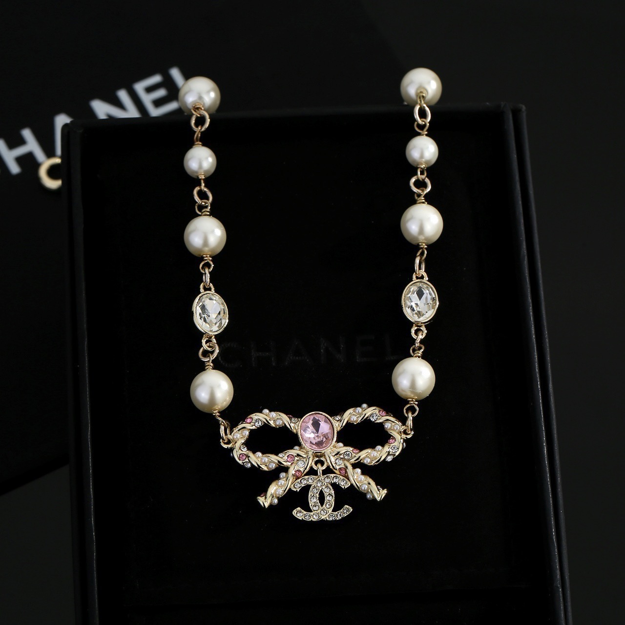 chanel pearl butterfly letter charm necklace