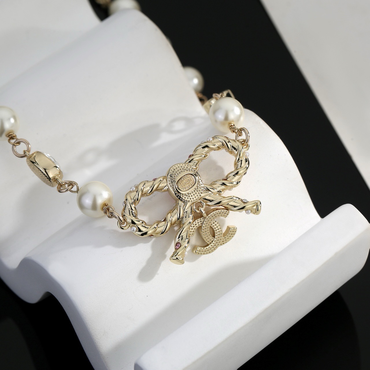 chanel pearl butterfly letter charm necklace