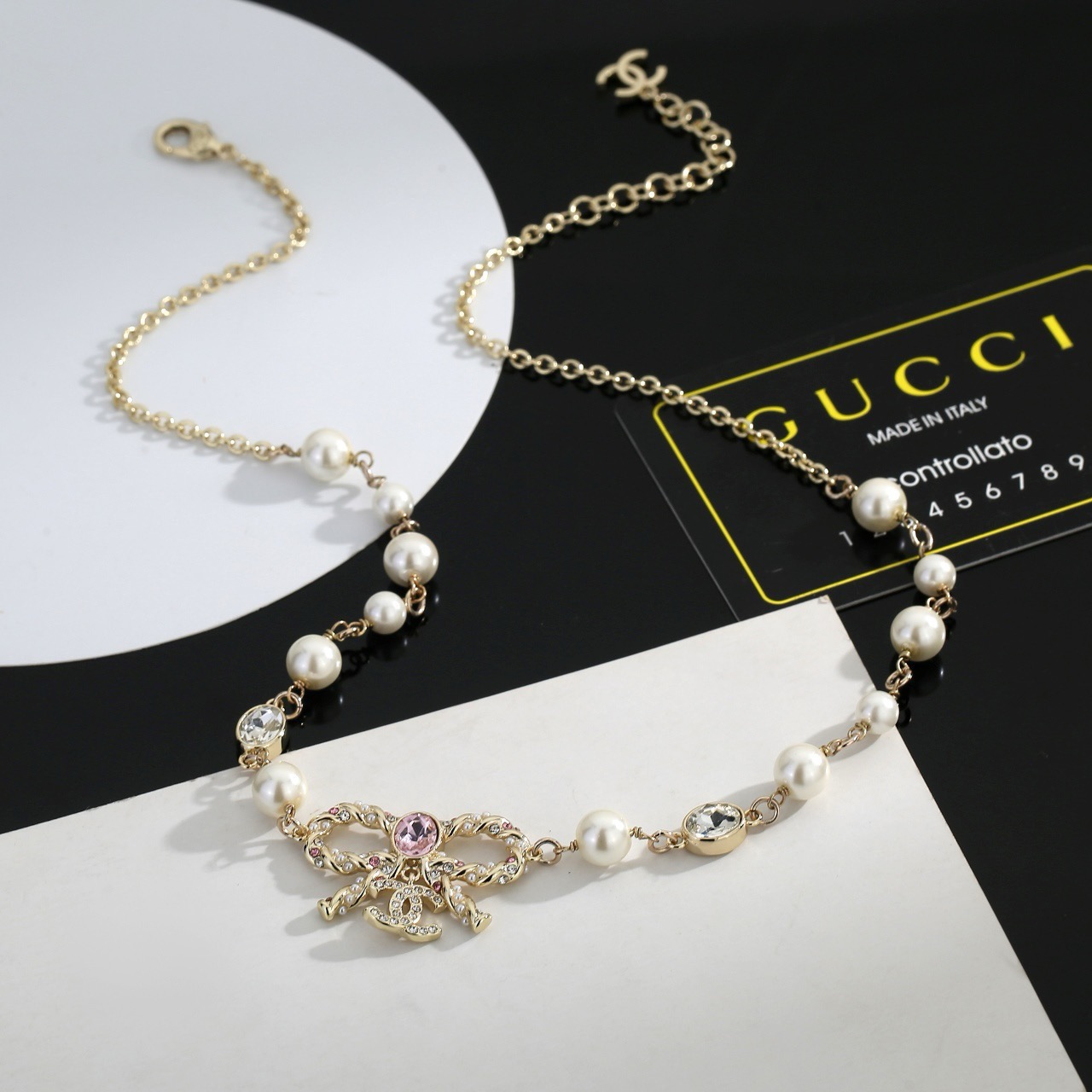 chanel pearl butterfly letter charm necklace
