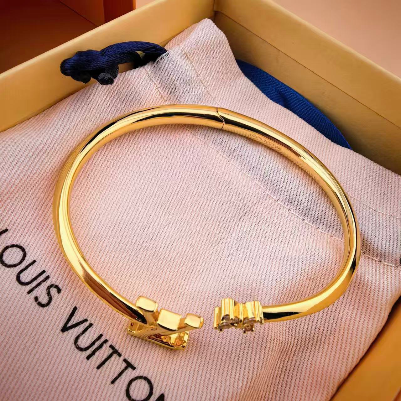 louis vuitton gold lv twig open bangle