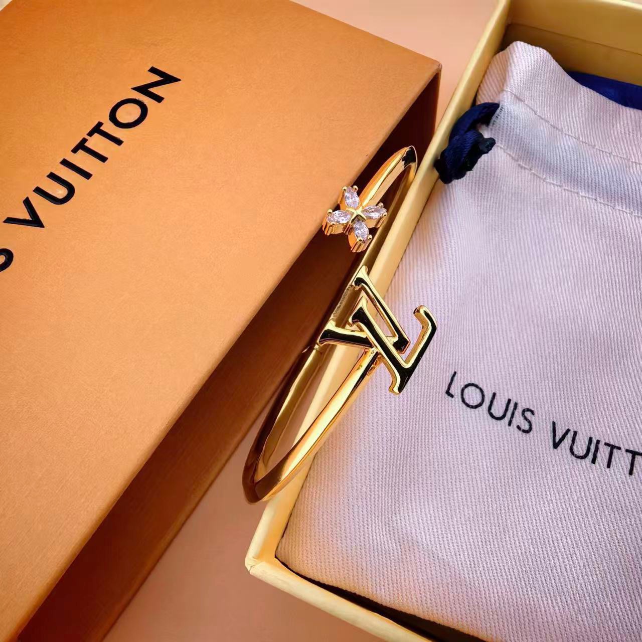louis vuitton gold lv twig open bangle