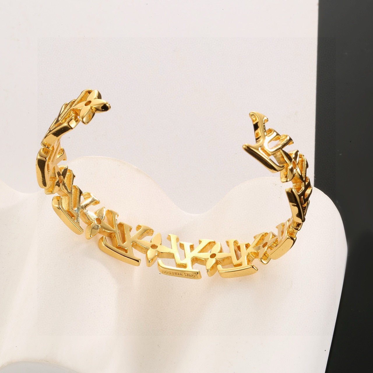 louis vuitton gold lv twig cuff bracelet