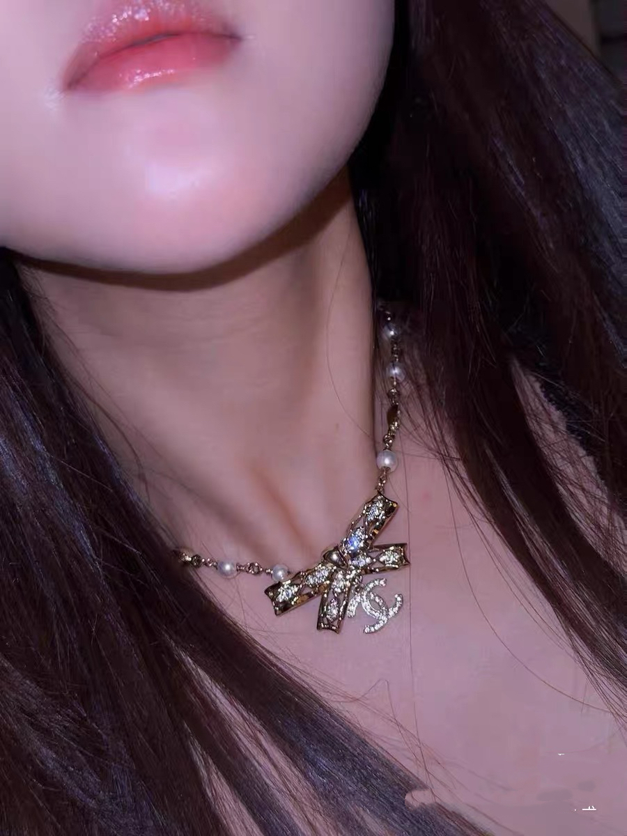 chanel pearl crystal butterfly letter necklace