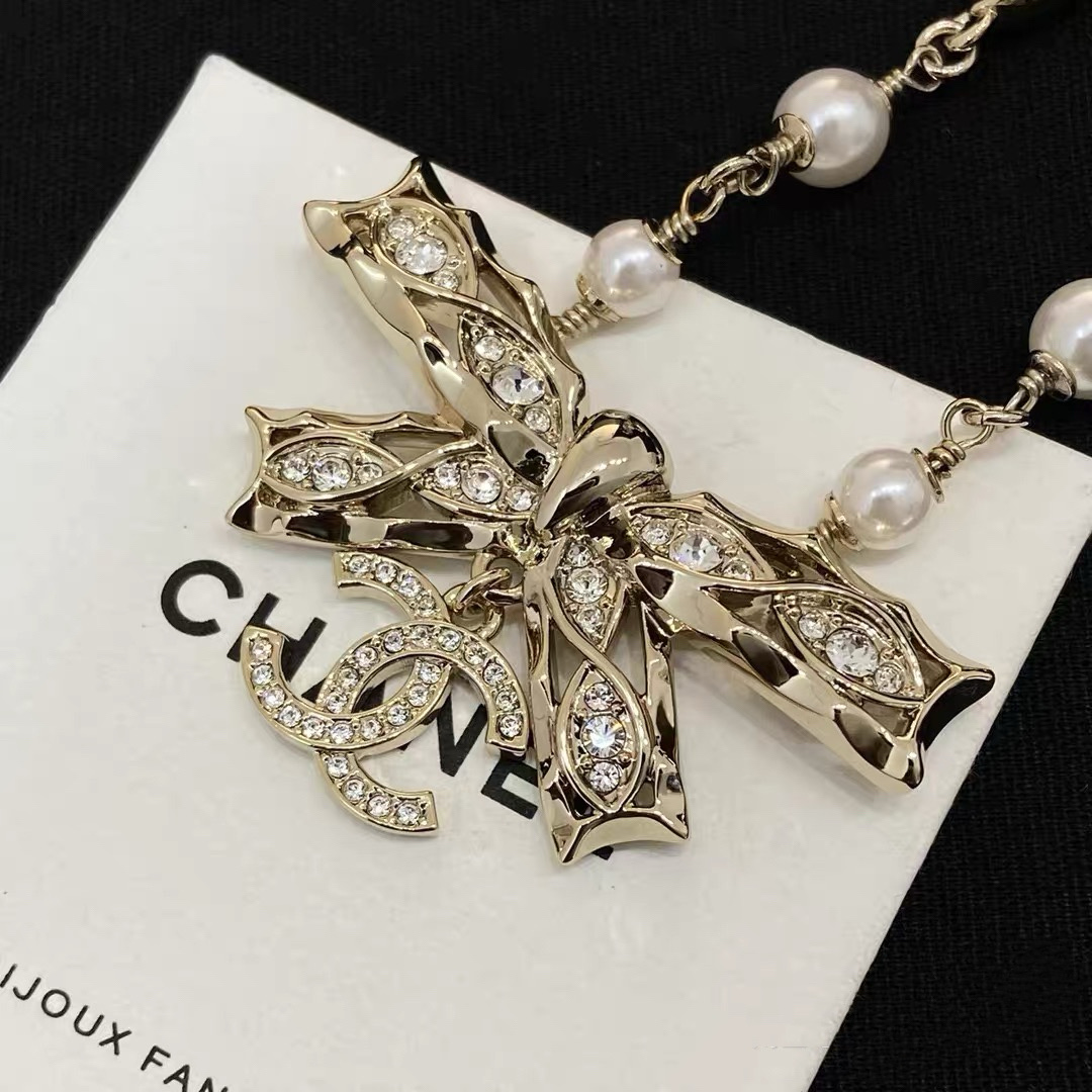 chanel pearl crystal butterfly letter necklace