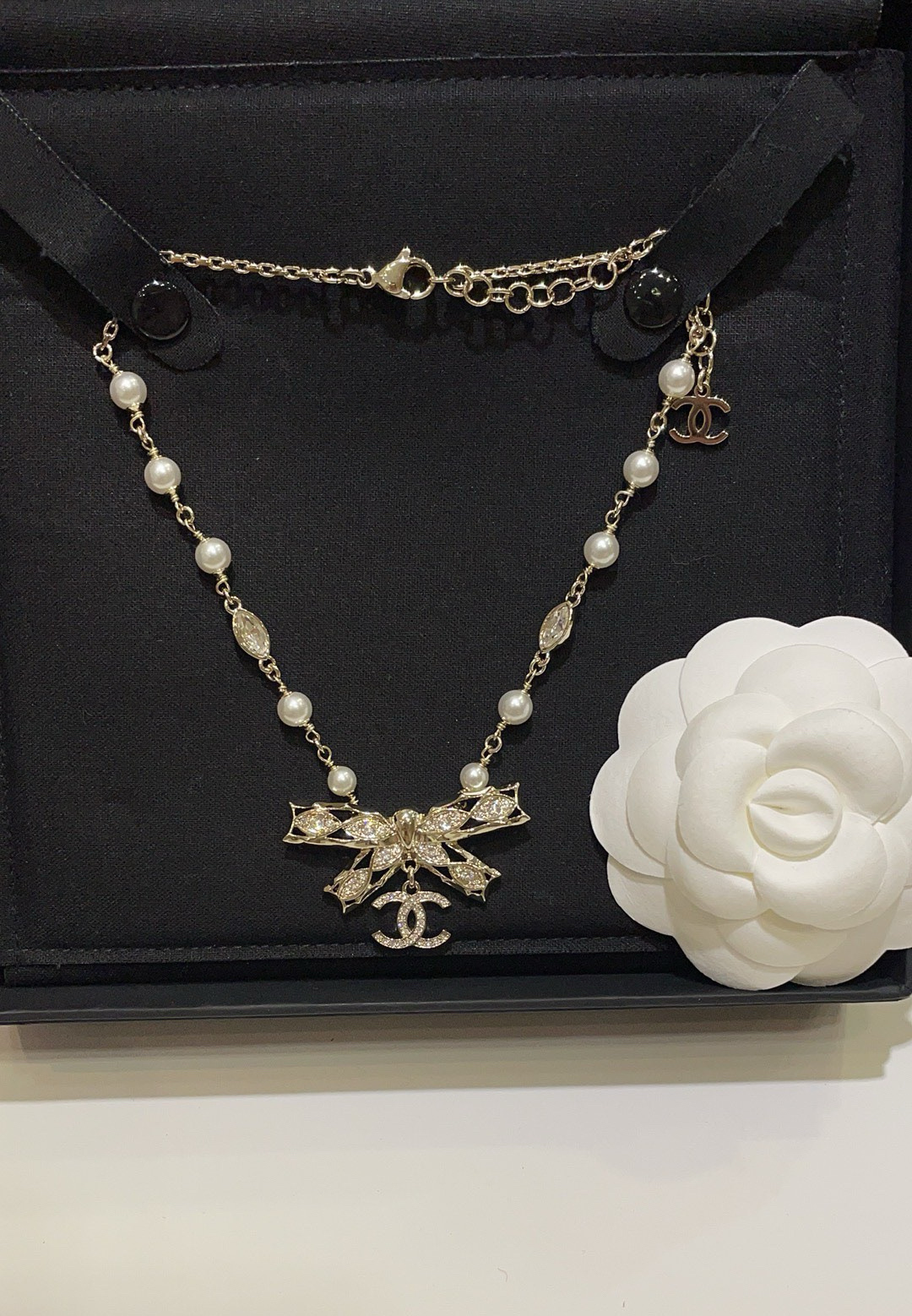 chanel pearl crystal butterfly letter necklace