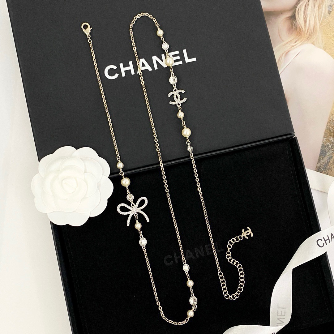 chanel pearl crystal bow cc long necklace