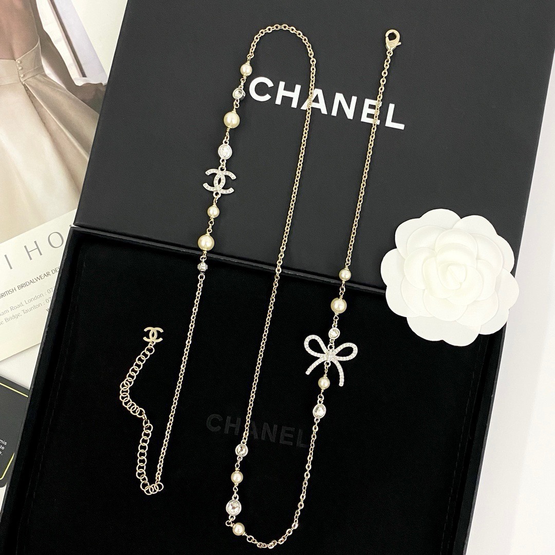 chanel pearl crystal bow cc long necklace