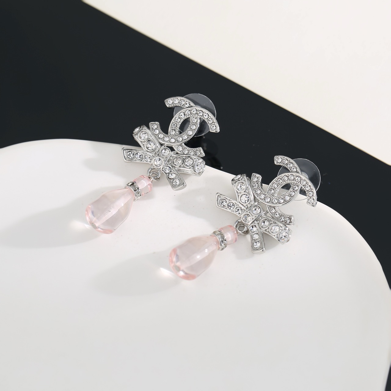 chanel silver bow pink pendant earrings