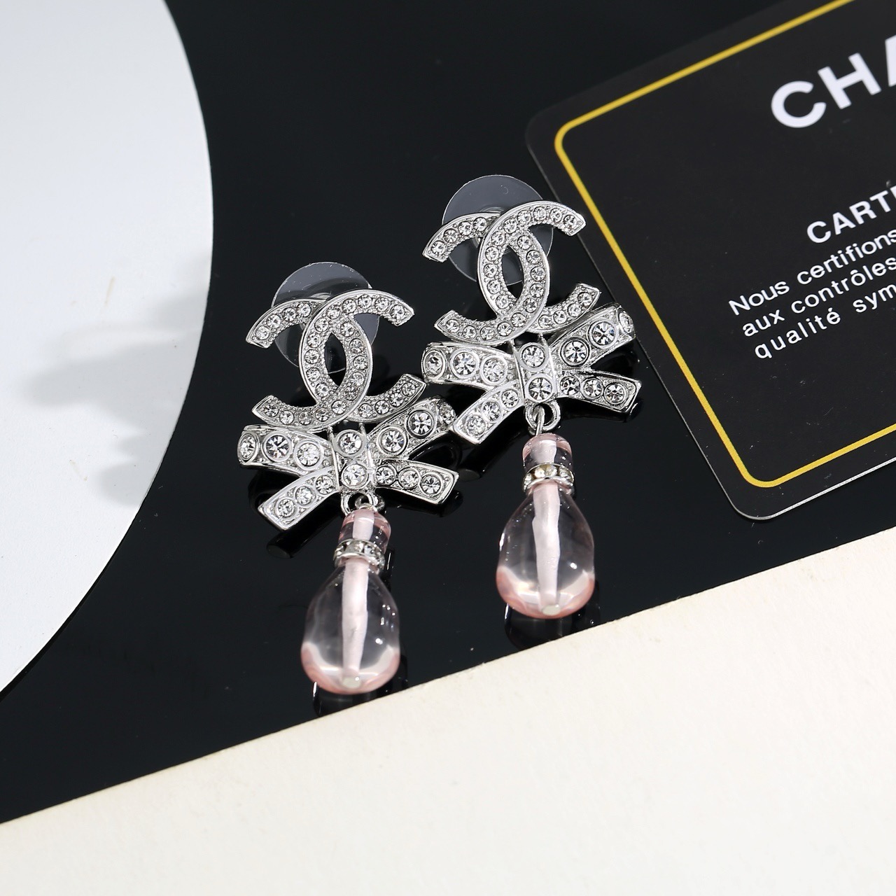 chanel silver bow pink pendant earrings