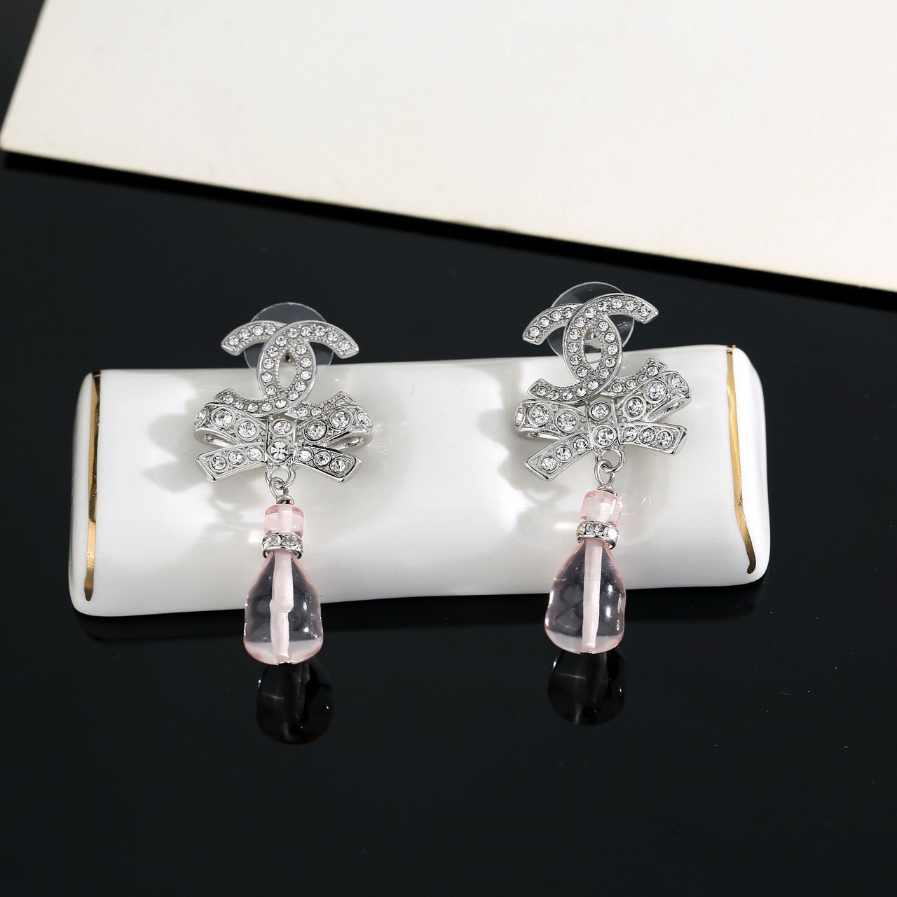 chanel silver bow pink pendant earrings