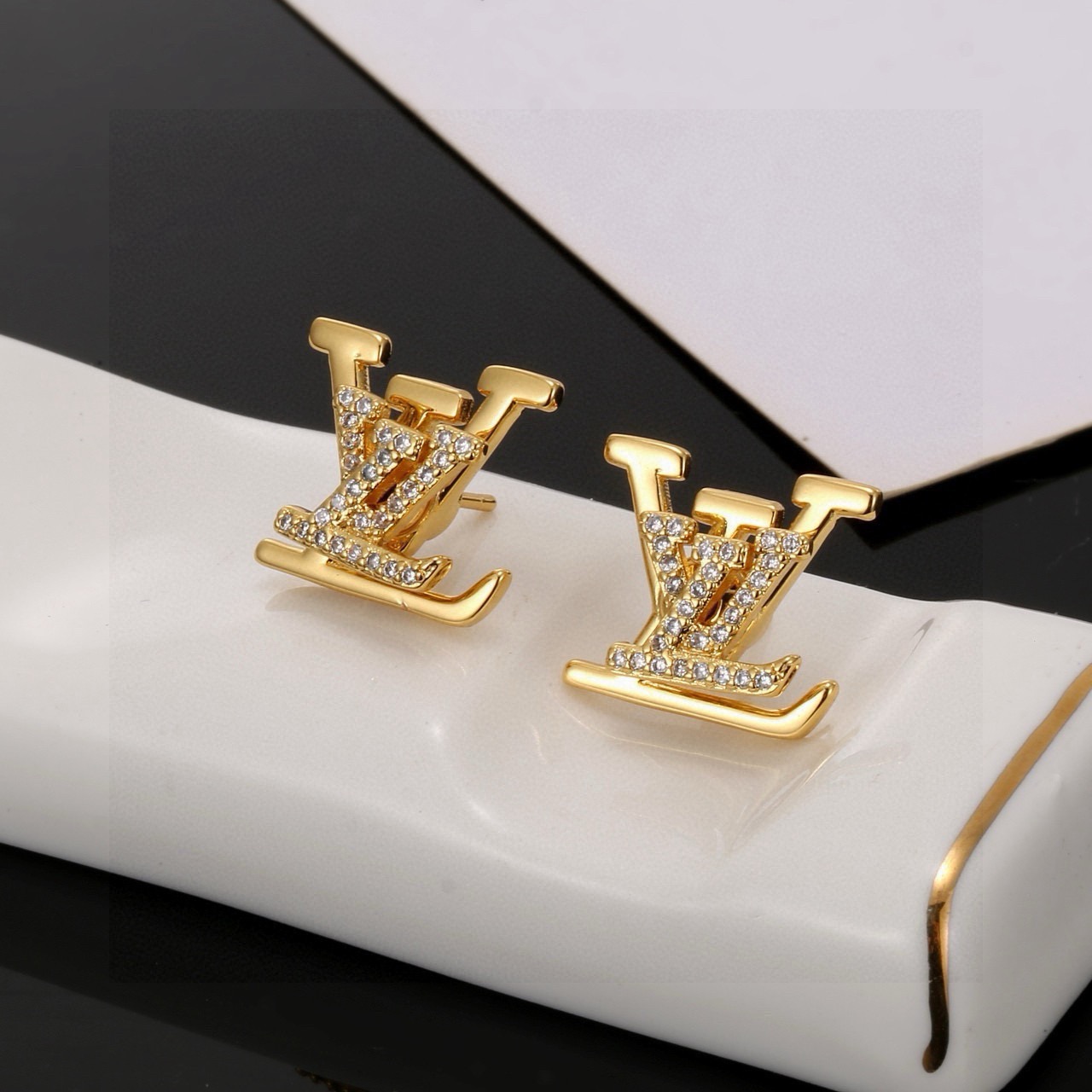 louis vuitton gold lv stud earrings