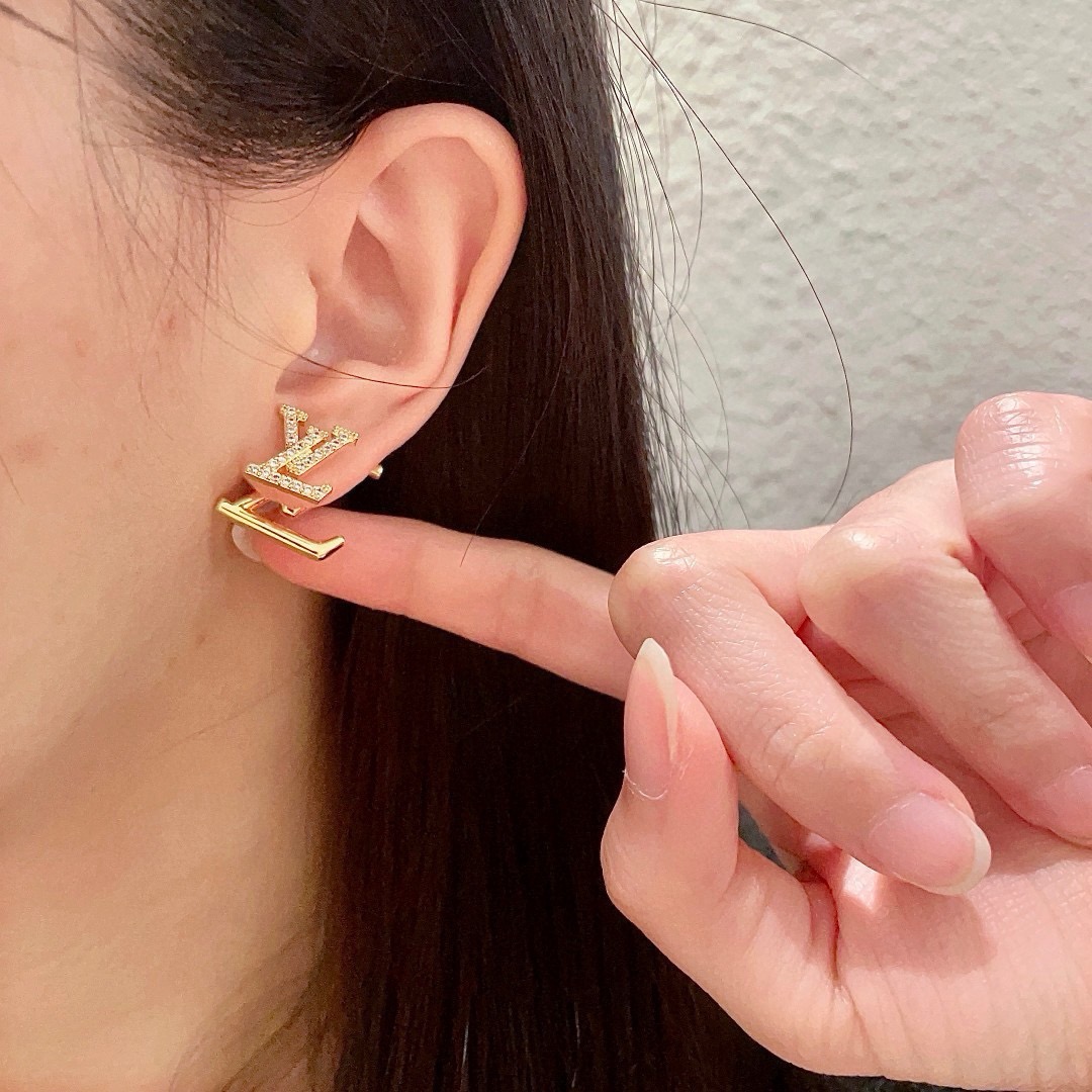 louis vuitton gold lv stud earrings
