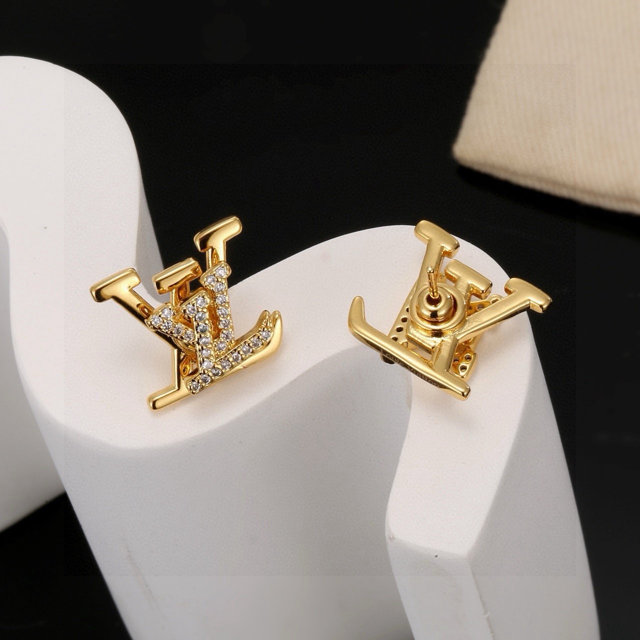 louis vuitton gold lv stud earrings