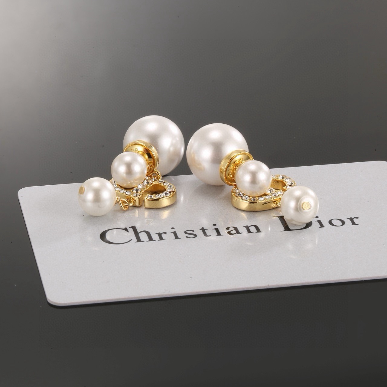 dior tribales pearl letter logo drop earrings