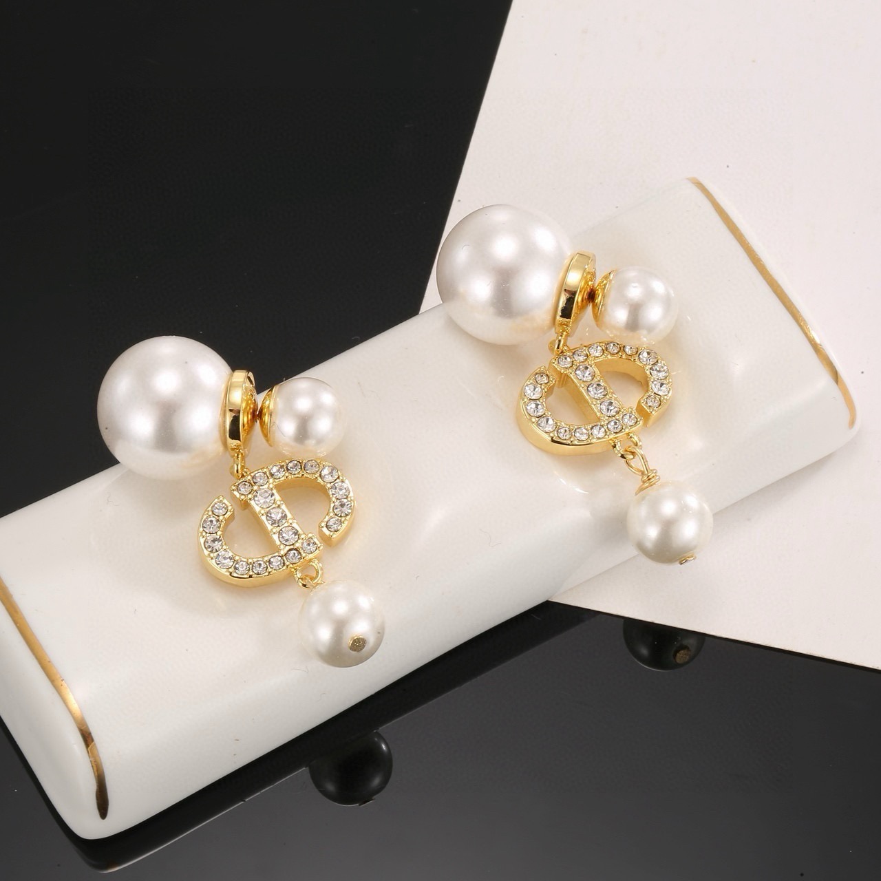 dior tribales pearl letter logo drop earrings