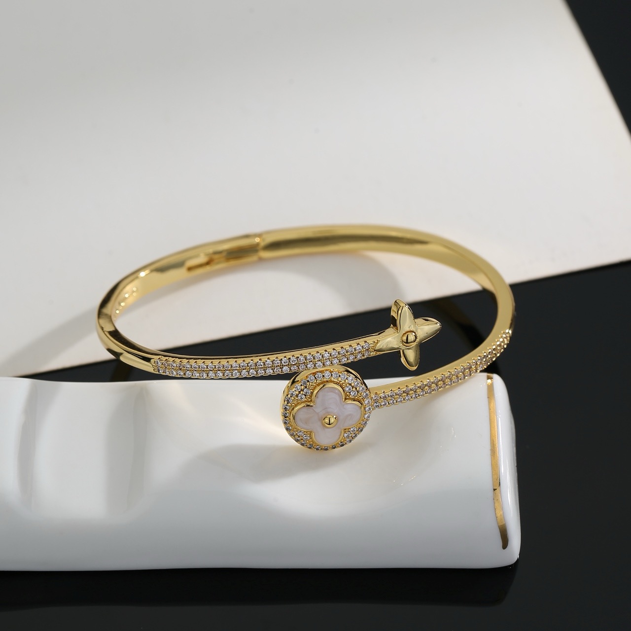 louis vuitton gold lv twig bangle