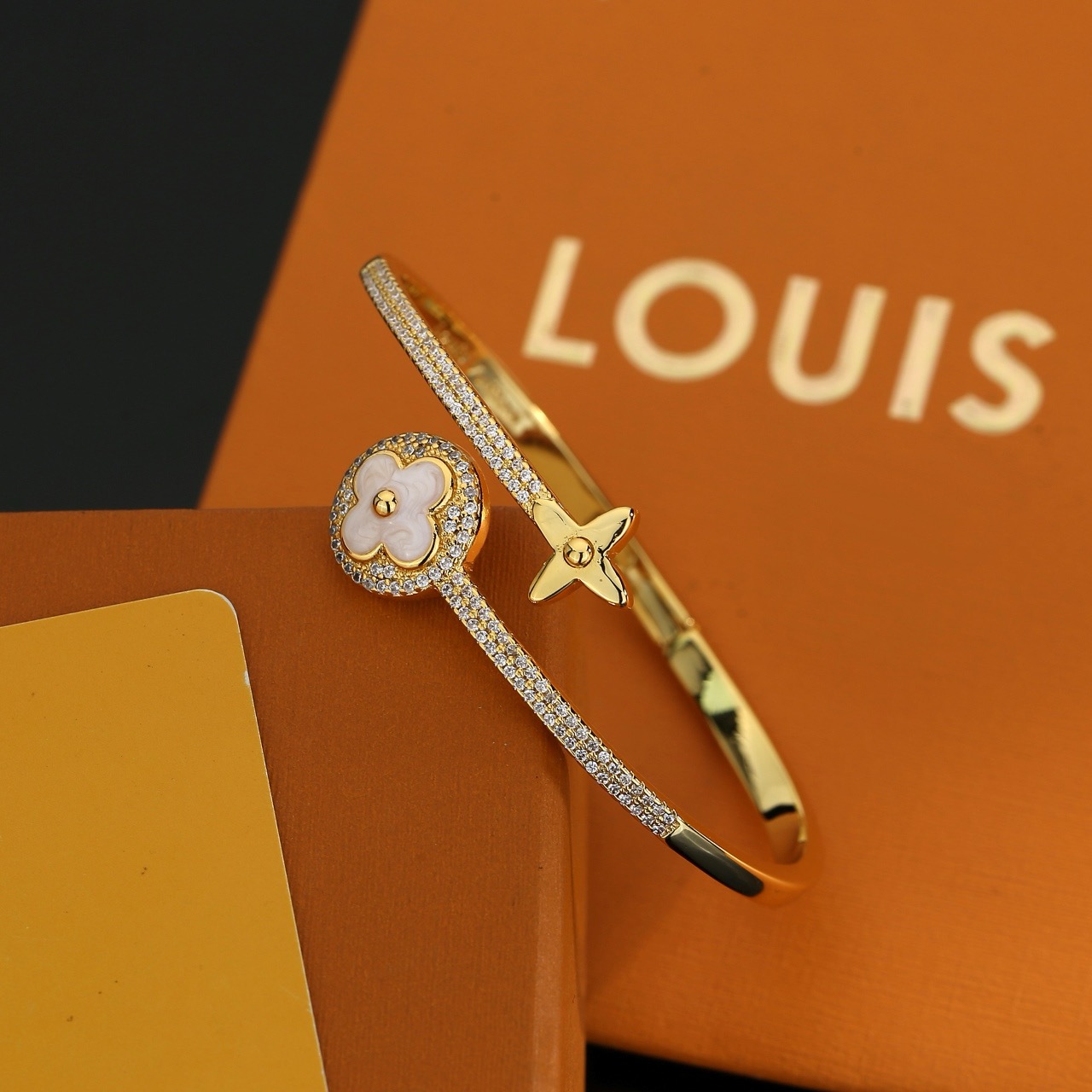 louis vuitton gold lv twig bangle