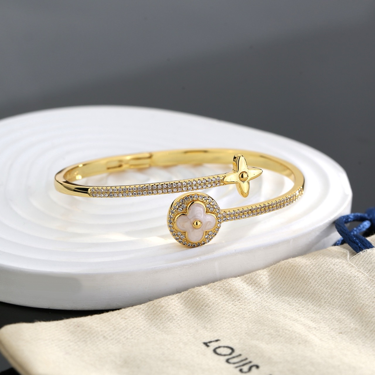 louis vuitton gold lv twig bangle