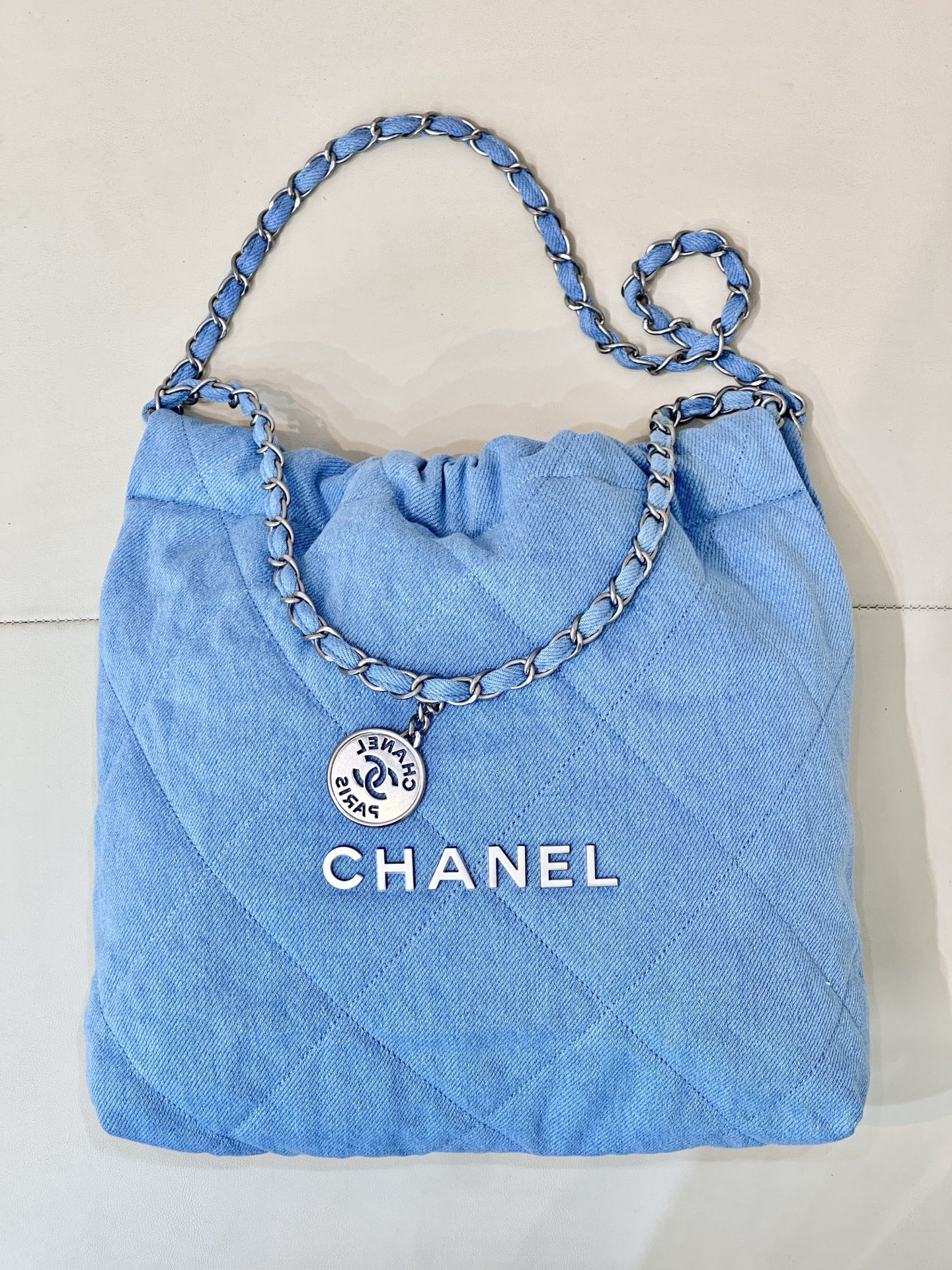 Chanel Blue Denim Quilted CC Charm Bucket Bag with Chain Strap 2 i1745057365451 3022 0 0