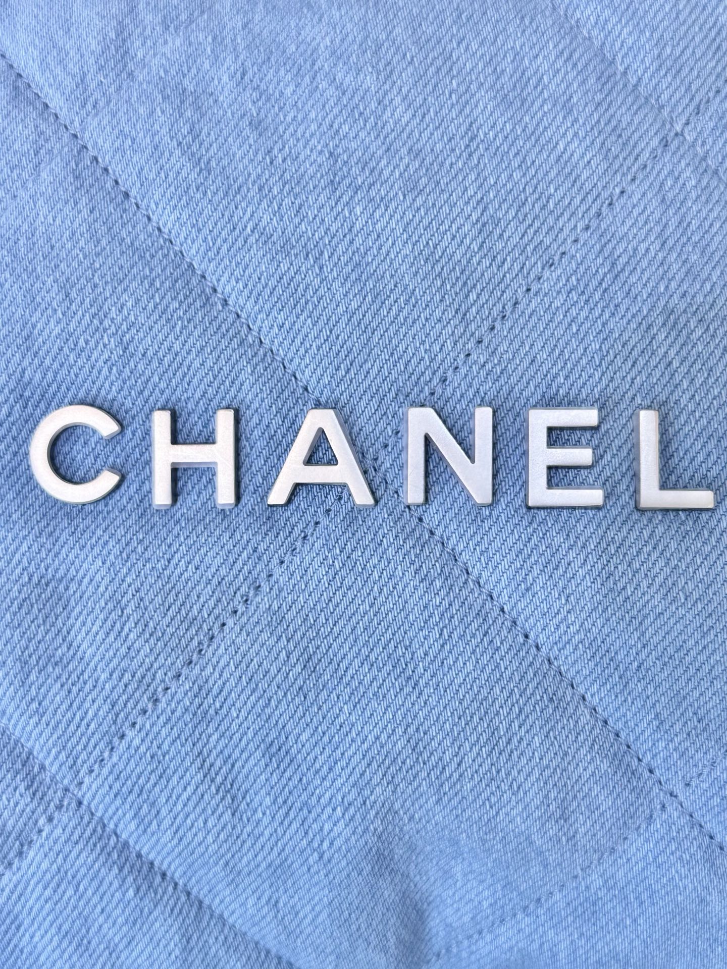 Chanel Women's Denim Jacket with Vintage Hardware and Clear Letter Edges 2 i1745057453393 777 0 1
