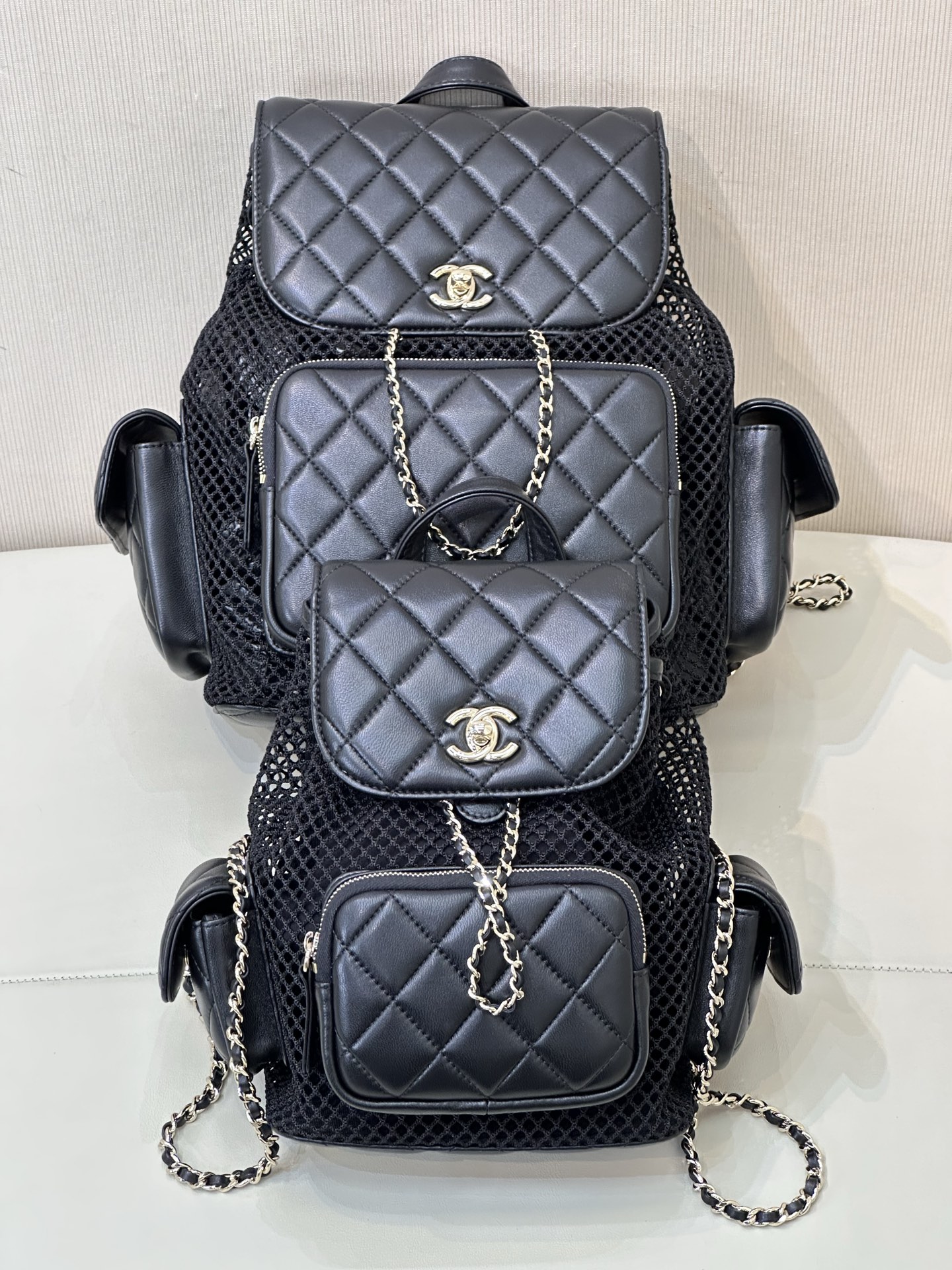 Chanel 25s Mesh Backpack, Quilted Design with CC Logo, Chain Accents 4 i1745314624143 3929 0 2