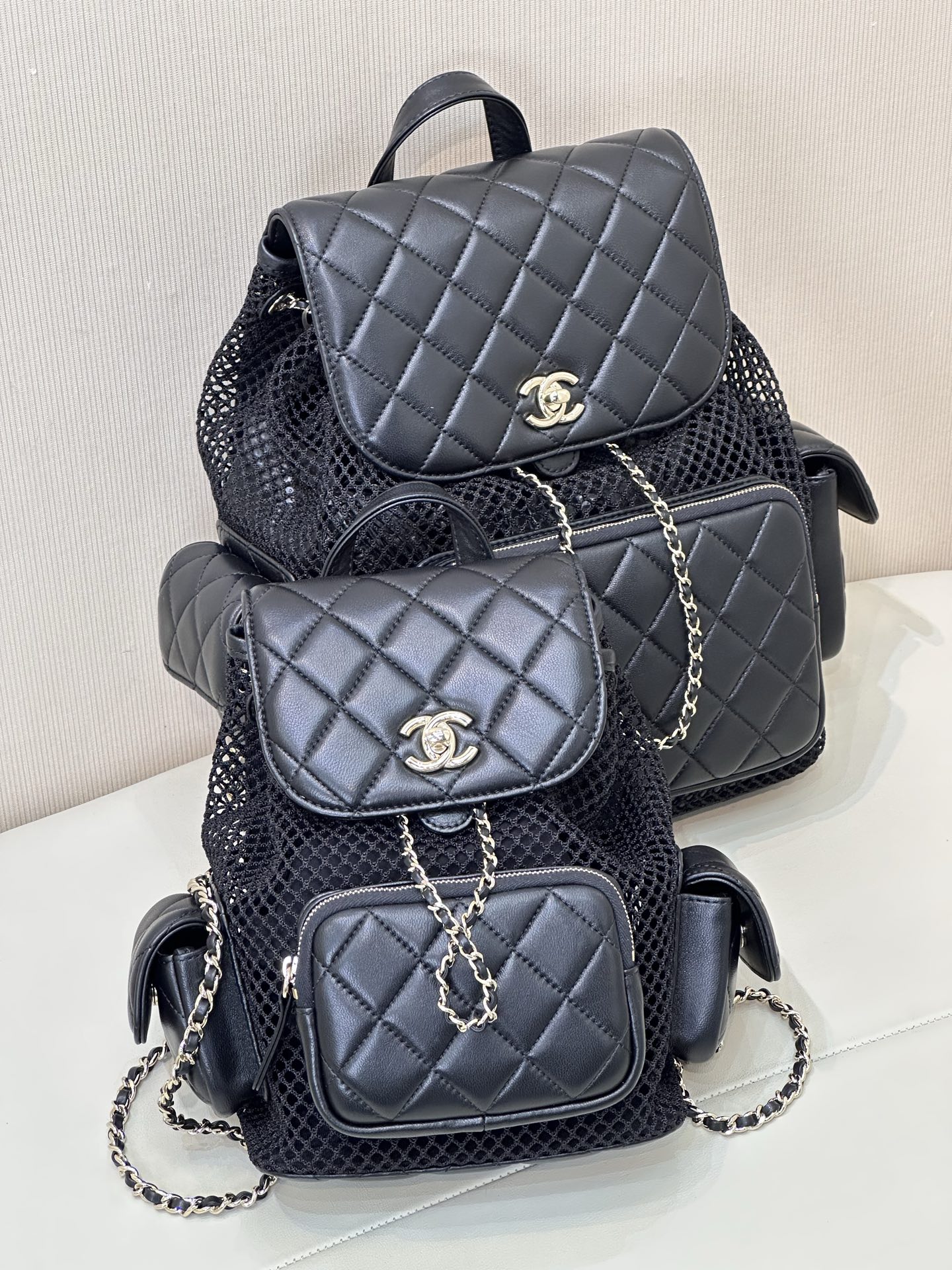 Chanel 25s Mesh Backpack, Quilted Design with CC Logo, Chain Accents 2 i1745314624287 7727 0 0