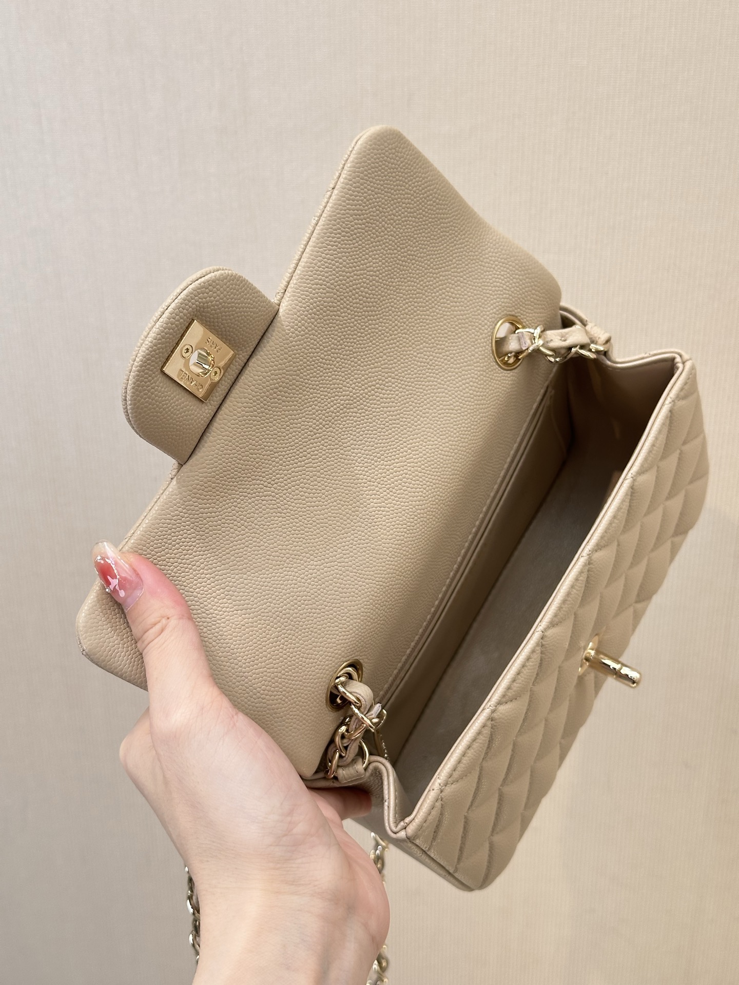 Chanel Classic Flap Bag, Beige Quilted Leather, Gold-Tone Hardware, Iconic Design