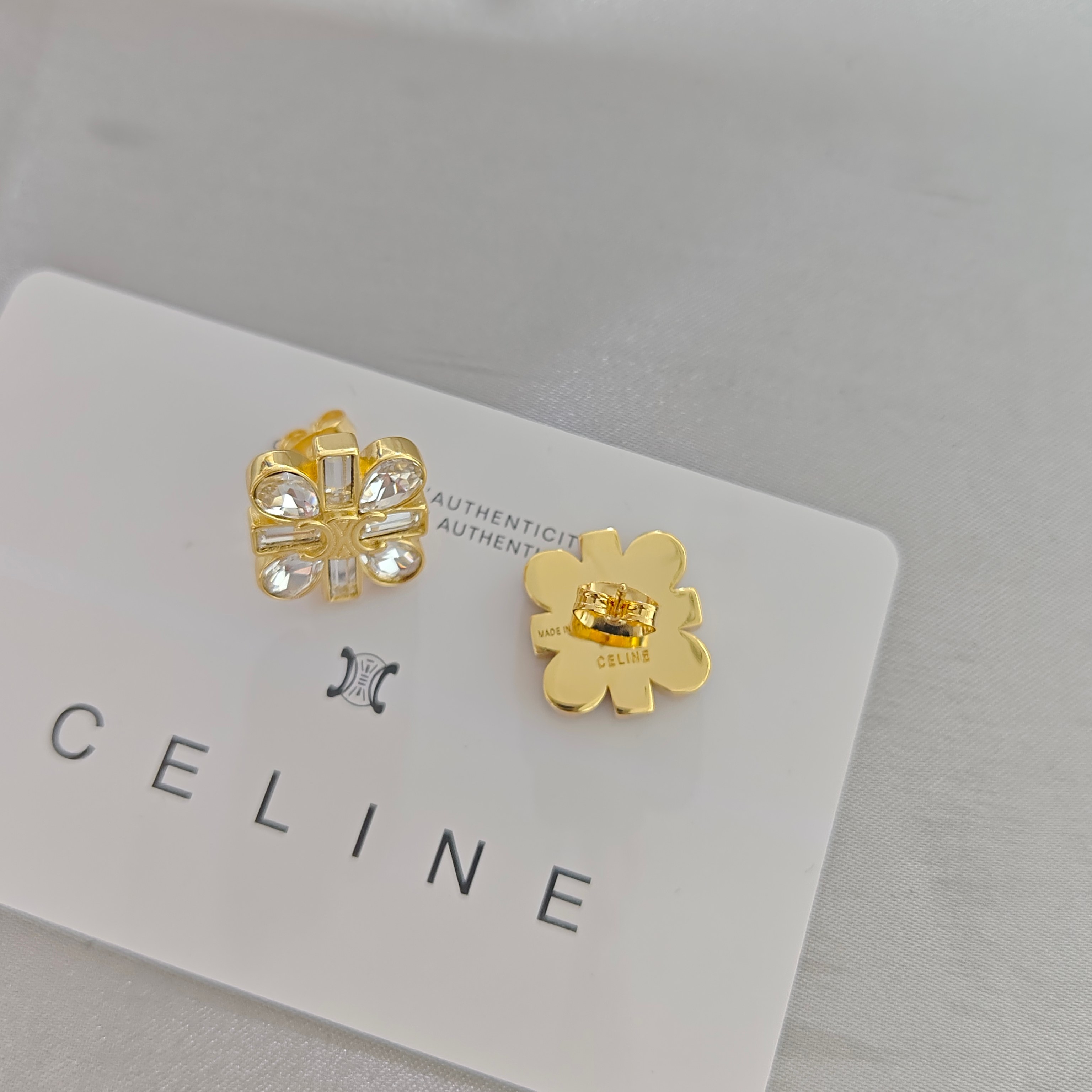 ￥88赛琳耳钉：新款凯旋门小雏菊daisy耳钉镶钻米字耳钉气质高级慵懒秋冬刘诗诗同款